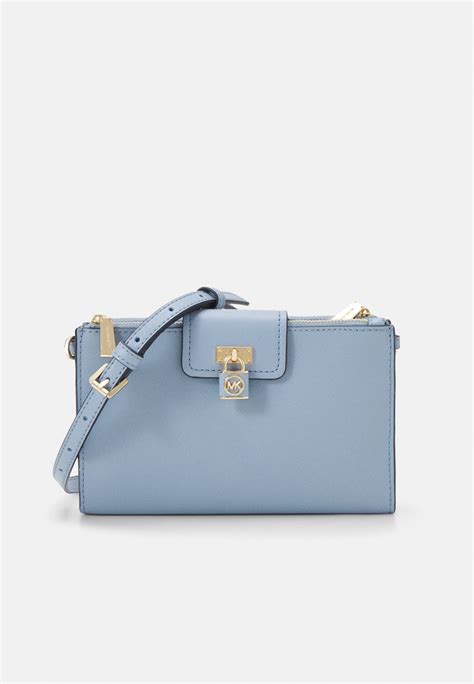 michael kors clutch hellblau|michael kors clutch handbags.